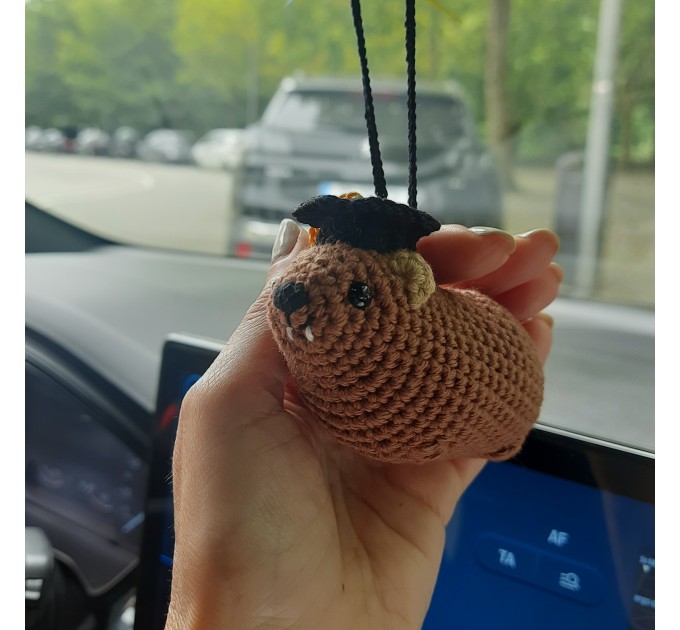Adorable handmade crochet Awawa wearing a graduation cap, navy cap, or Luffy straw hat, cute hyrax keychain, bag charm, or rear view mirror charm gift