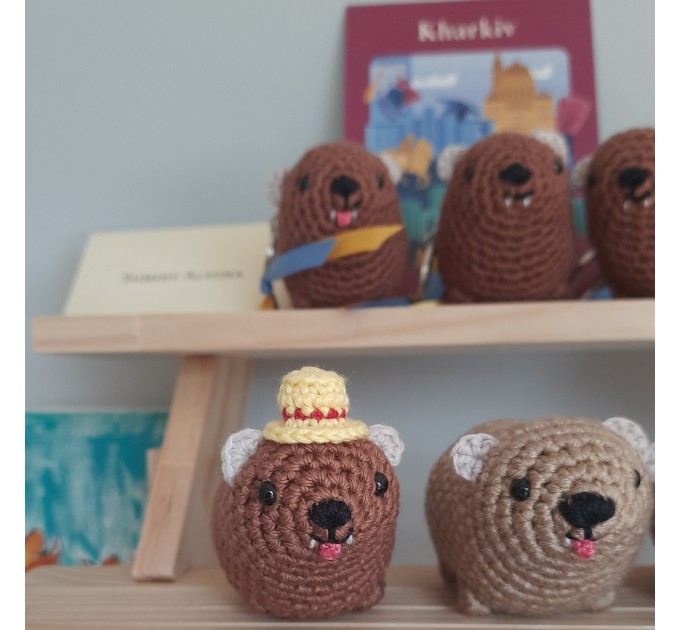 Adorable handmade crochet Awawa wearing a graduation cap, navy cap, or Luffy straw hat, cute hyrax keychain, bag charm, or rear view mirror charm gift