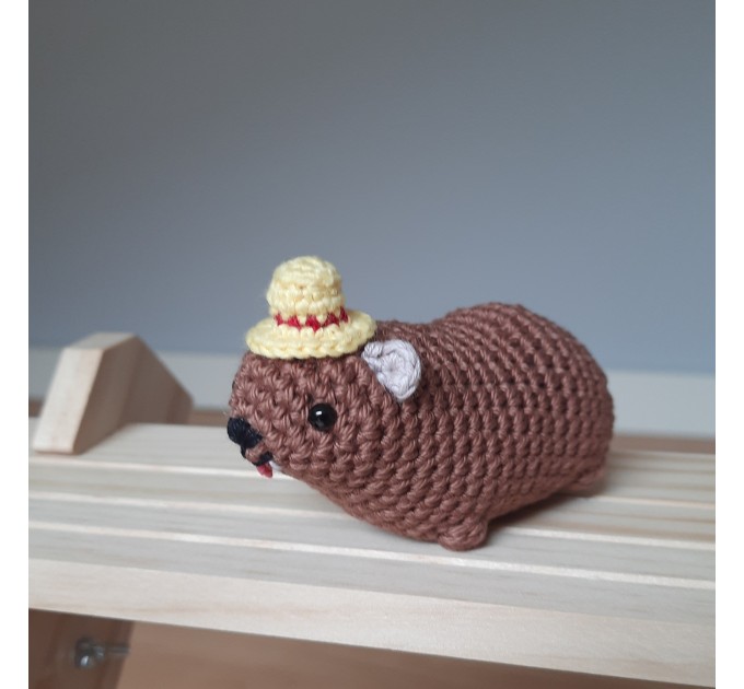 Adorable handmade crochet Awawa wearing a graduation cap, navy cap, or Luffy straw hat, cute hyrax keychain, bag charm, or rear view mirror charm gift