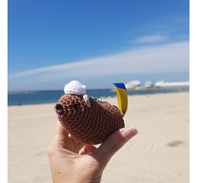 Adorable handmade crochet Awawa wearing a graduation cap, navy cap, or Luffy straw hat, cute hyrax keychain, bag charm, or rear view mirror charm gift