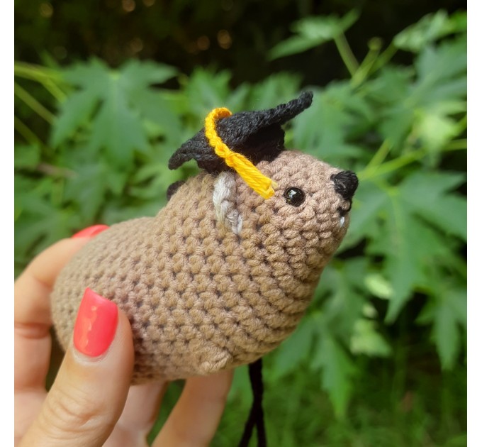 Adorable handmade crochet Awawa wearing a graduation cap, navy cap, or Luffy straw hat, cute hyrax keychain, bag charm, or rear view mirror charm gift