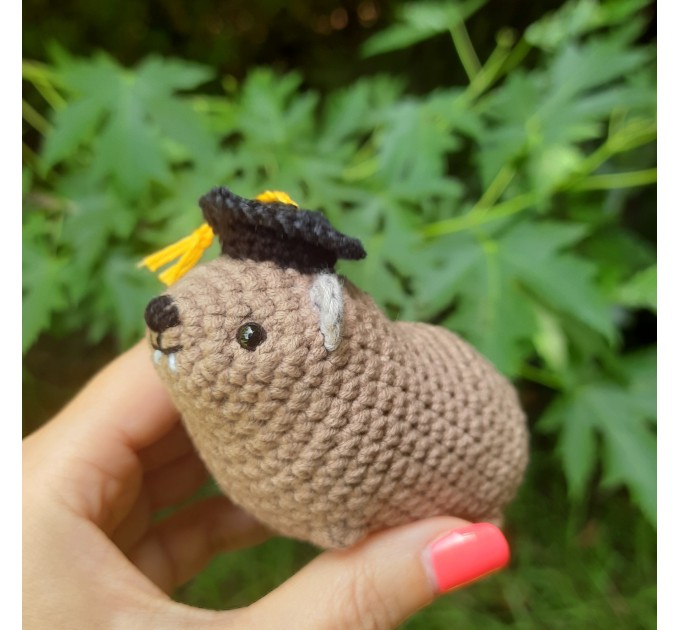Adorable handmade crochet Awawa wearing a graduation cap, navy cap, or Luffy straw hat, cute hyrax keychain, bag charm, or rear view mirror charm gift