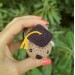 Adorable handmade crochet Awawa wearing a graduation cap, navy cap, or Luffy straw hat, cute hyrax keychain, bag charm, or rear view mirror charm gift
