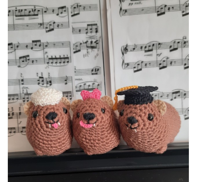 Adorable handmade crochet Awawa wearing a graduation cap, navy cap, or Luffy straw hat, cute hyrax keychain, bag charm, or rear view mirror charm gift