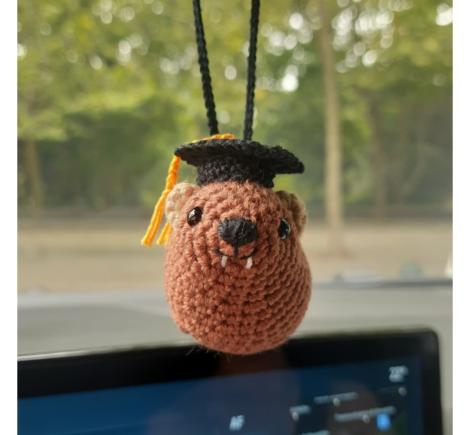 Adorable handmade crochet Awawa wearing a graduation cap, navy cap, or Luffy straw hat, cute hyrax keychain, bag charm, or rear view mirror charm gift