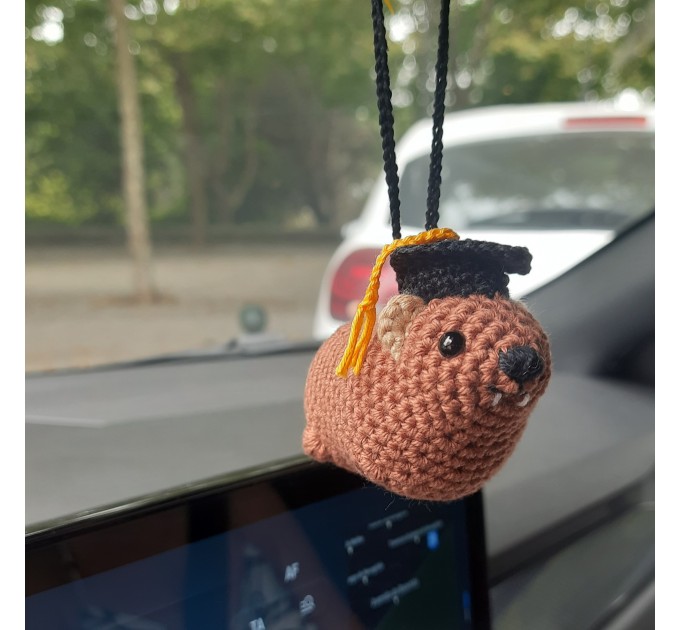 Adorable handmade crochet Awawa wearing a graduation cap, navy cap, or Luffy straw hat, cute hyrax keychain, bag charm, or rear view mirror charm gift