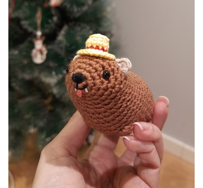 Adorable handmade crochet Awawa wearing a graduation cap, navy cap, or Luffy straw hat, cute hyrax keychain, bag charm, or rear view mirror charm gift