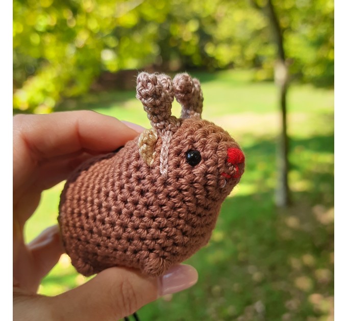 Christmas style Awawa wearing Xmas sweater, hat or reindeer, cute crochet Hyrax keychain, bag charm or rear view mirror car accessory