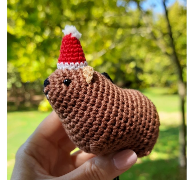 Christmas style Awawa wearing Xmas sweater, hat or reindeer, cute crochet Hyrax keychain, bag charm or rear view mirror car accessory