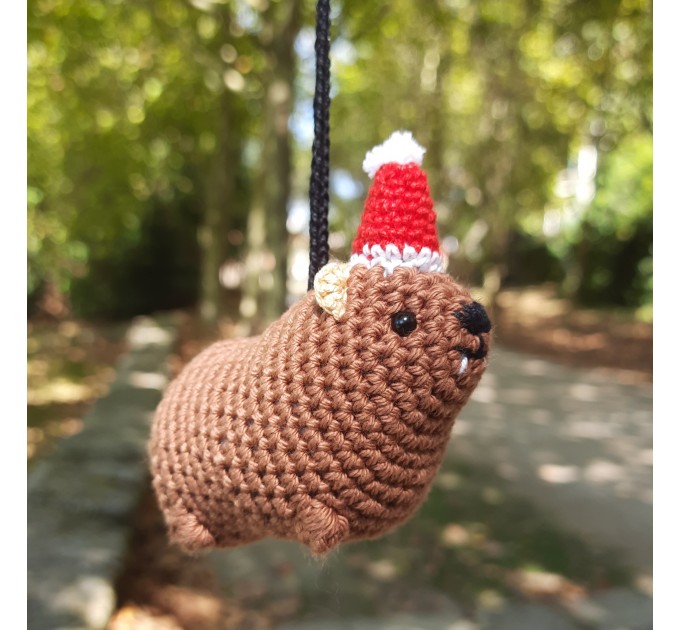 Christmas style Awawa wearing Xmas sweater, hat or reindeer, cute crochet Hyrax keychain, bag charm or rear view mirror car accessory