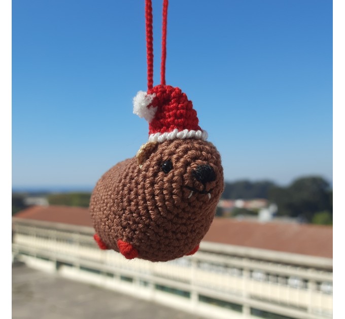 Christmas style Awawa wearing Xmas sweater, hat or reindeer, cute crochet Hyrax keychain, bag charm or rear view mirror car accessory